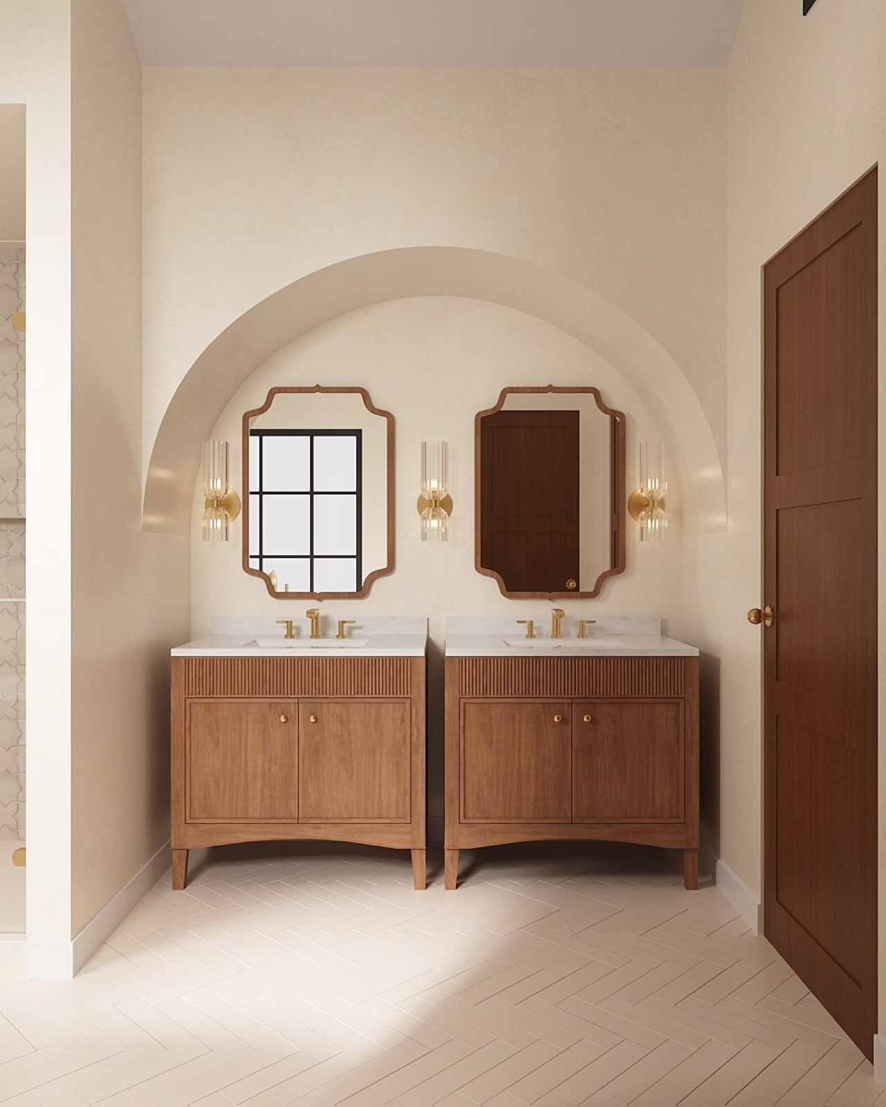 Mediterranean double vanity bathroom with arched alcove, walnut cabinets, and gold fixtures