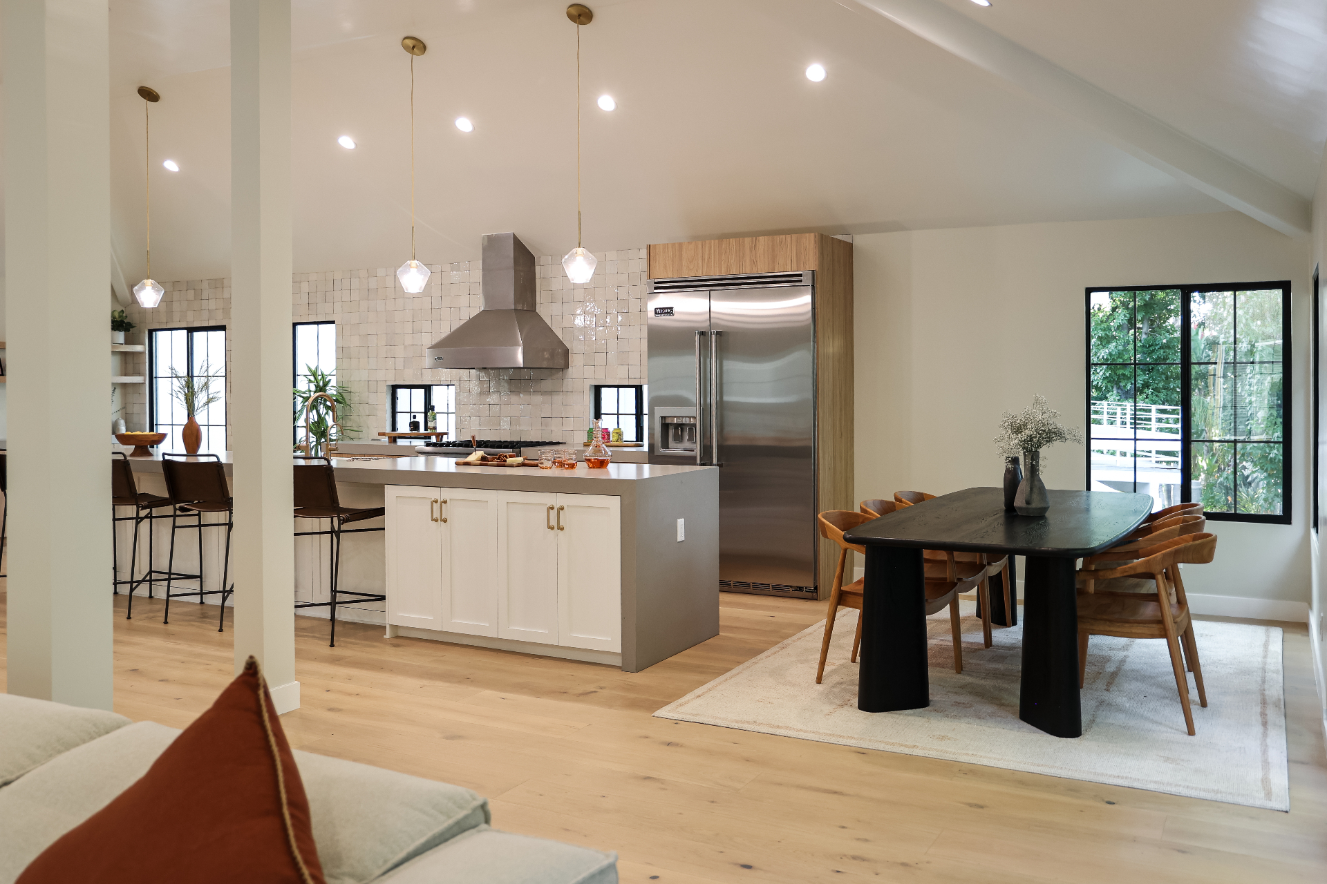 Open kitchen and dining space with seamless flow and modern design elements