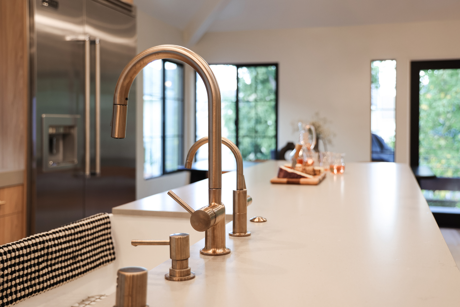 Modern kitchen faucet and sink detail showing quality fixtures and finishes