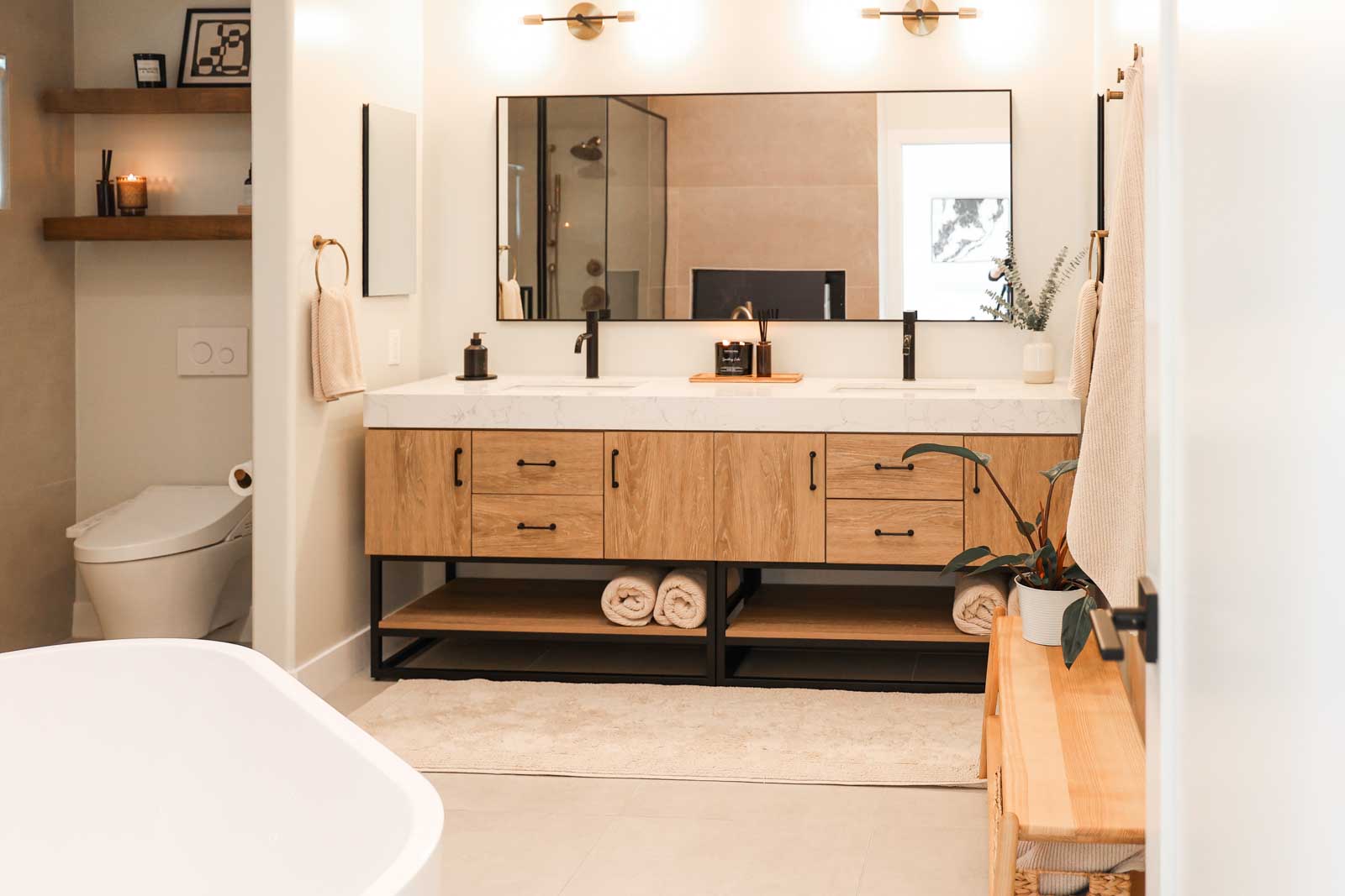 Los Angeles master bathroom addition with contemporary walk-in shower, floating vanity, and premium tile finishes