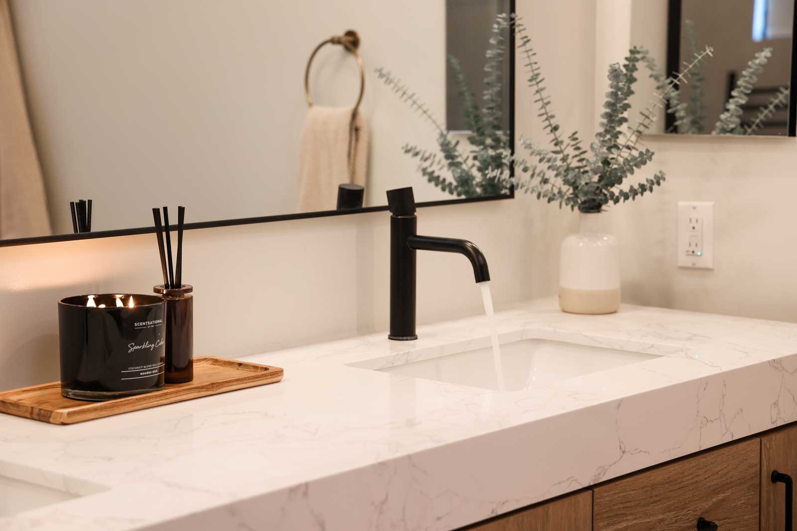 Custom Los Angeles bathroom vanity with elegant wood cabinetry, brushed nickel hardware, and marble countertop detail