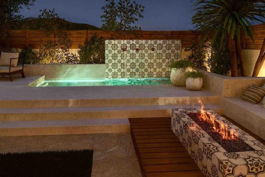 Glendale outdoor living design with olive trees and patio